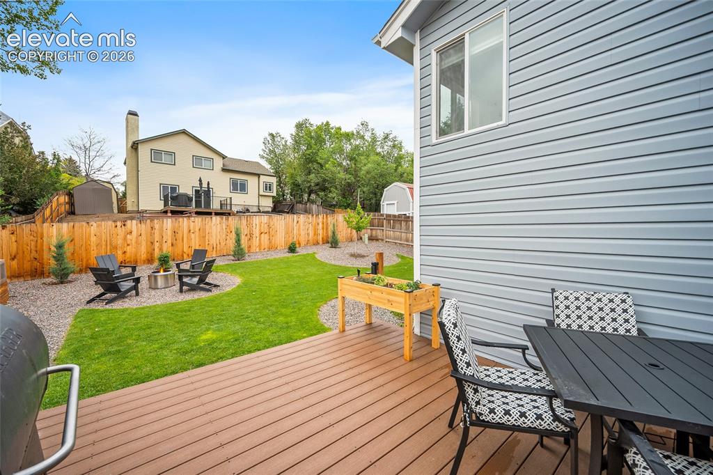 Image 42 of 50: Manicured lawn, newly installed privacy fence and lots of hosting space