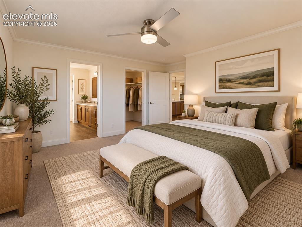 Image 12 of 34: Primary Bedroom – Another angle showcases the primary suite’s open layout a