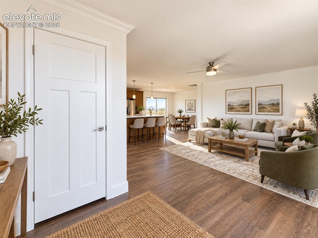Image 2 of 34: Entry / Open Living Area – Welcoming entry features a convenient coat close