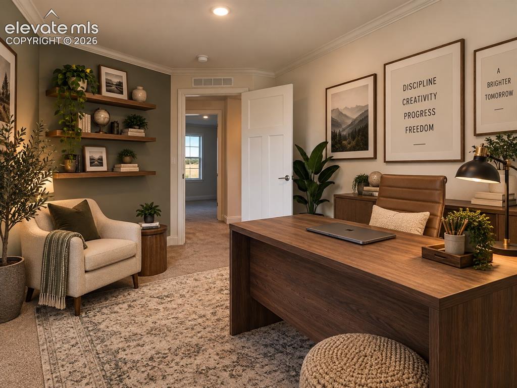 Image 21 of 34: Bed Room / Office – Versatile carpeted room shown as a home office, offerin