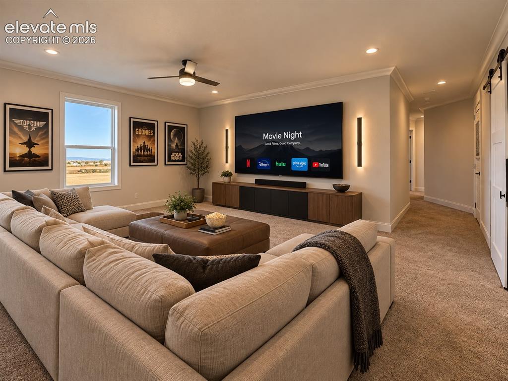 Image 23 of 34: Another view highlights the generous proportions of the family room, abunda
