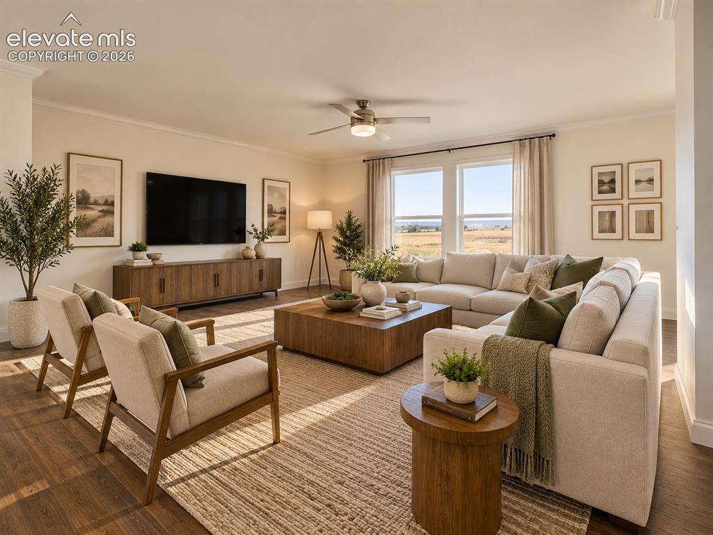 Image 3 of 34: Another view highlights the living room’s substantial footprint, large wind