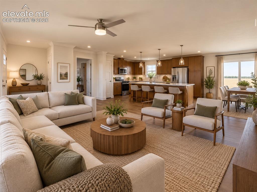 Image 5 of 34: Great Room – Wide-angle view emphasizes the spacious main living area, abun