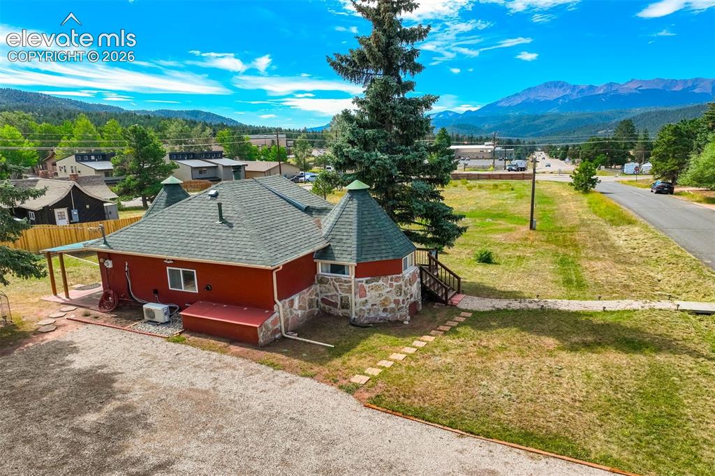 Image 3 of 37: View of home with view of the mountains and Pikes Peak