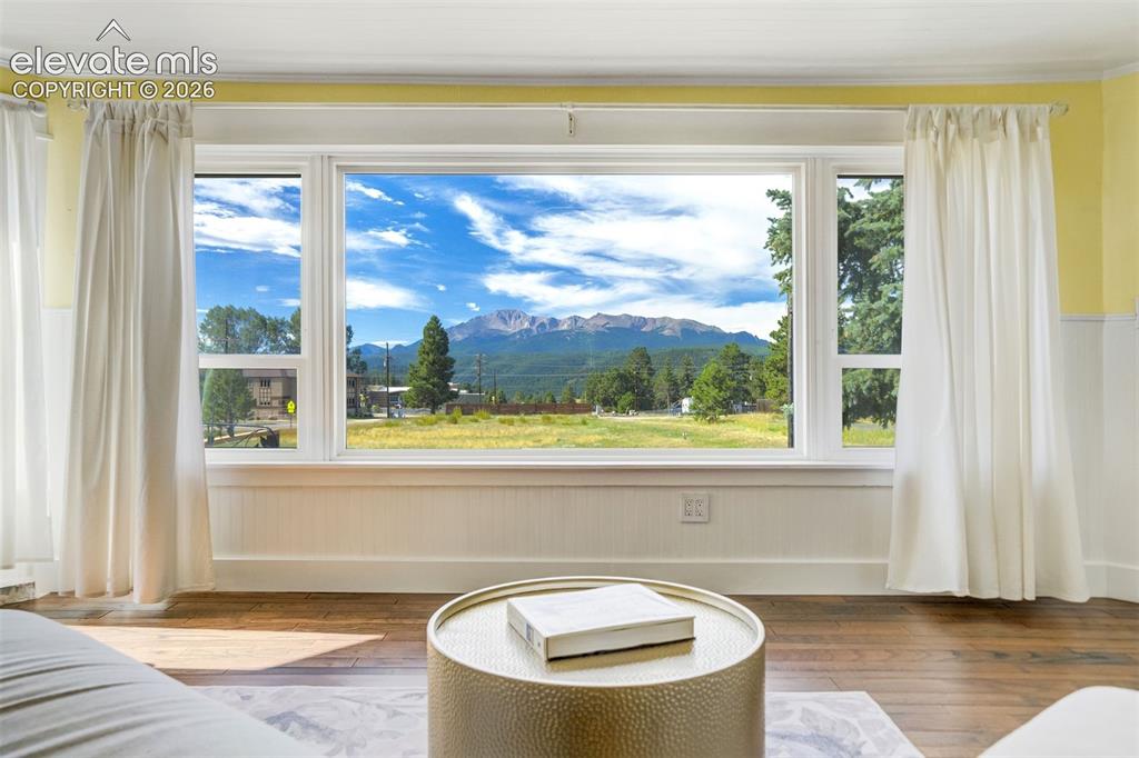 Image 7 of 37: View of Pikes Peak out the living room picture window!