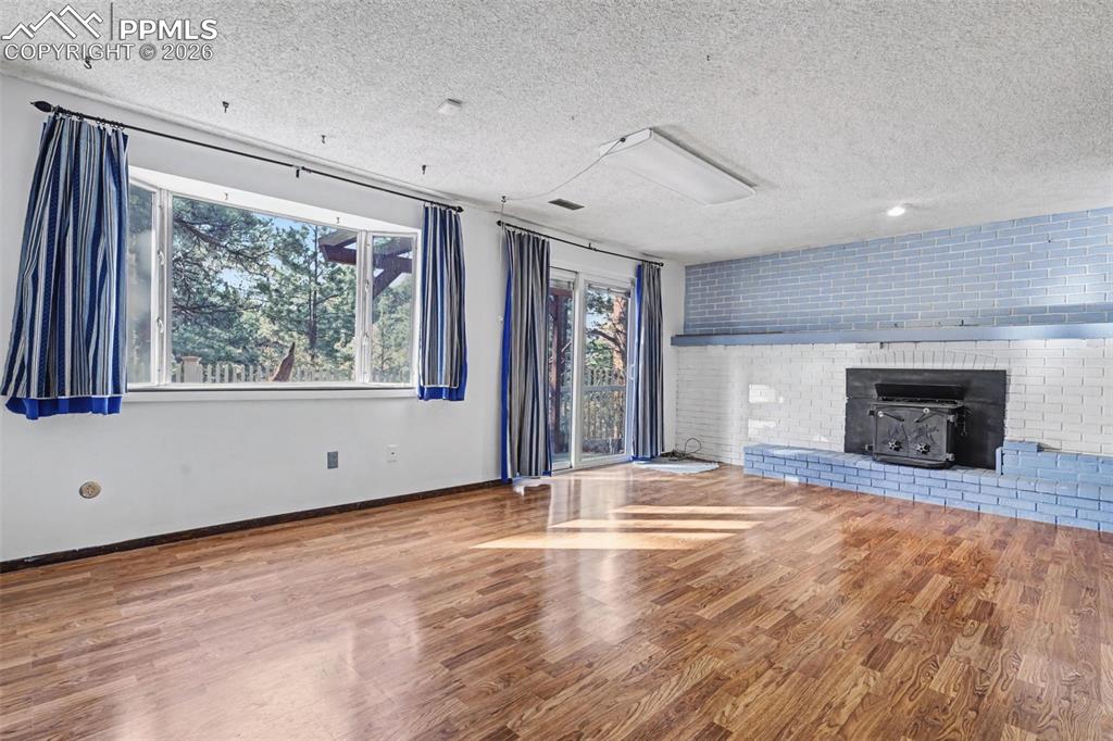 Image 24 of 38: Lower/basement walk out family room 