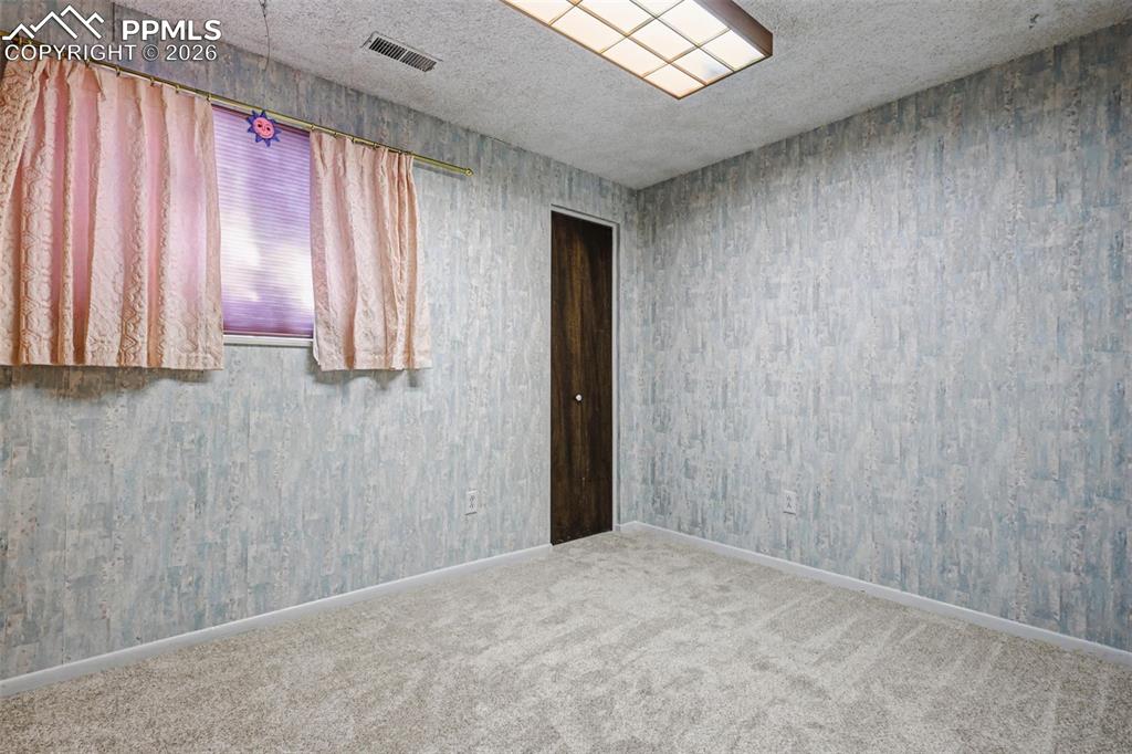 Image 27 of 38: Bedroom