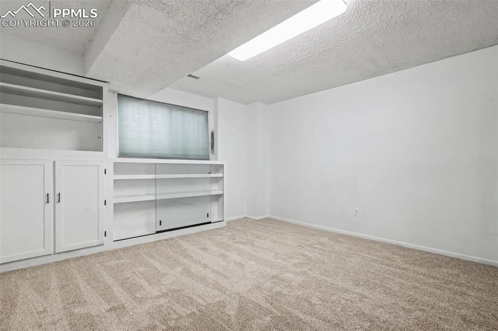 Image 29 of 38: Bedroom