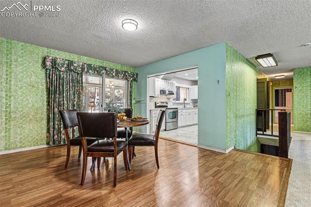 Image 6 of 38: Large, formal dining room 