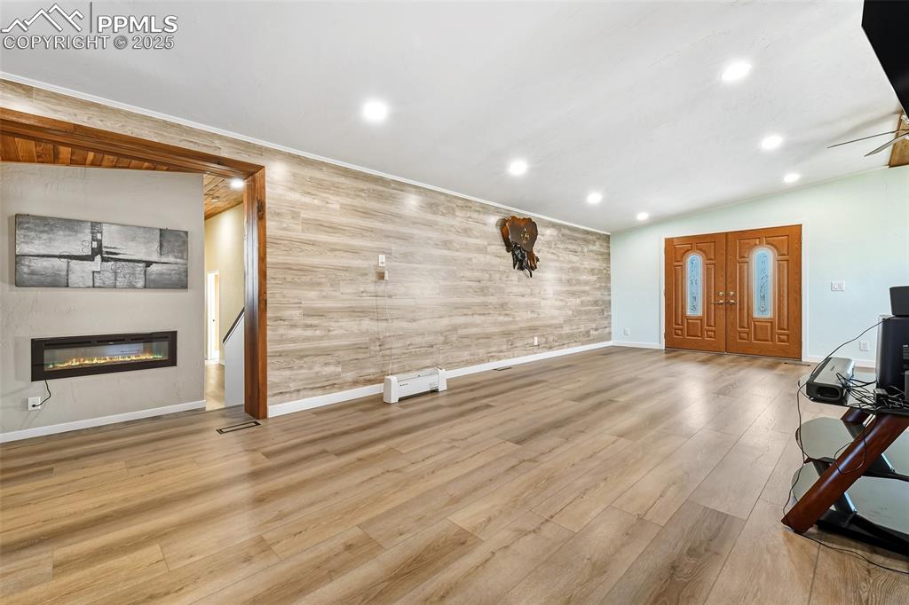 Image 6 of 46: Main entrance into Living Room