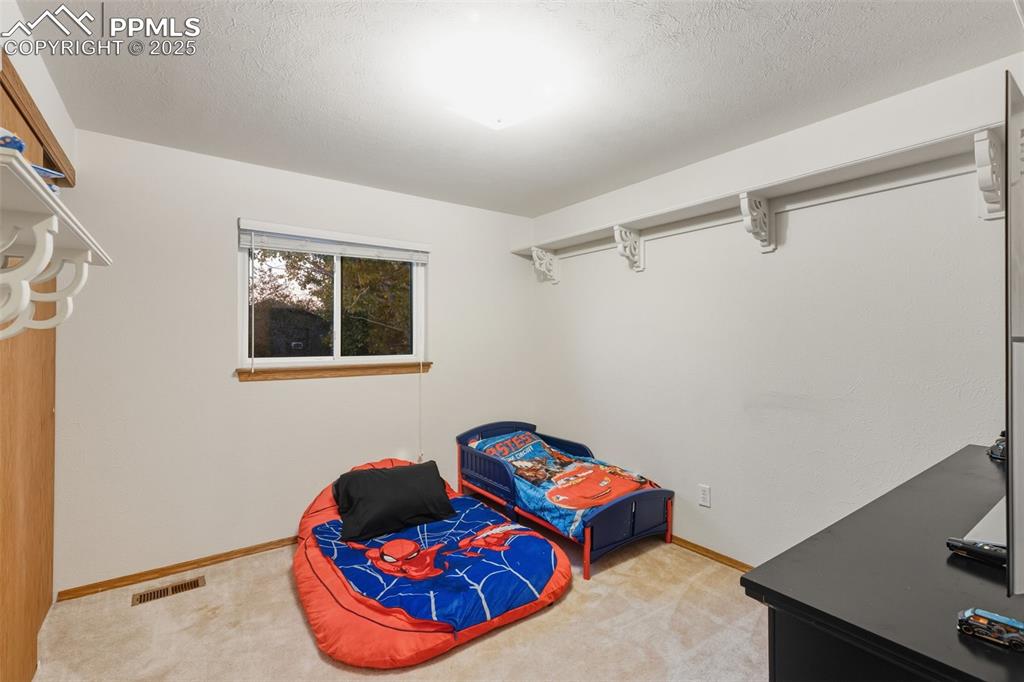 Image 32 of 37: Bedroom