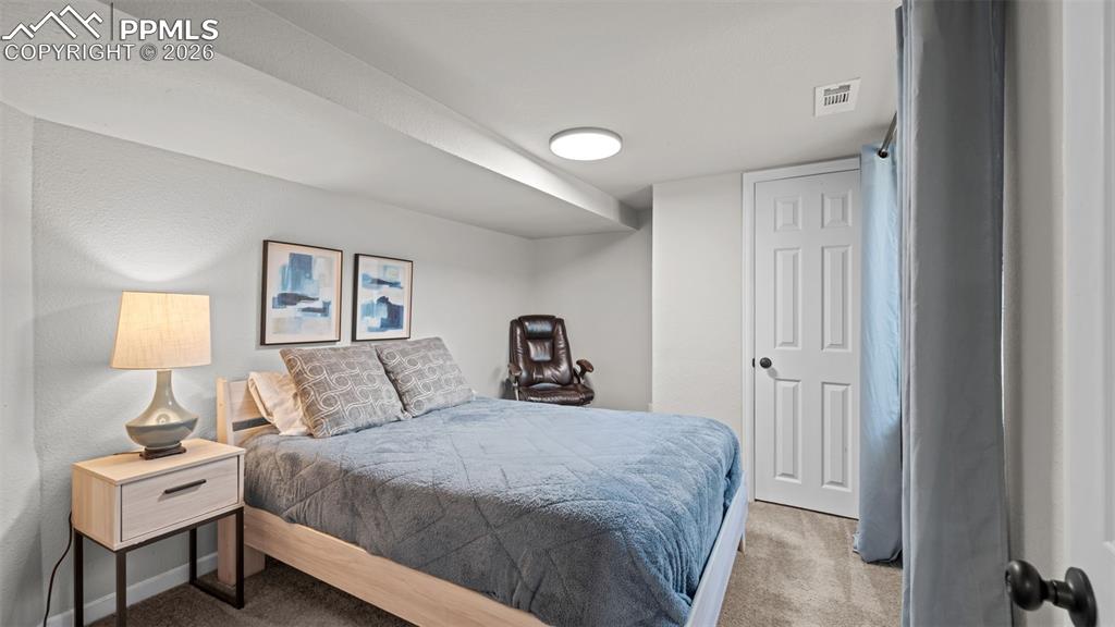 Image 27 of 37: Bedroom