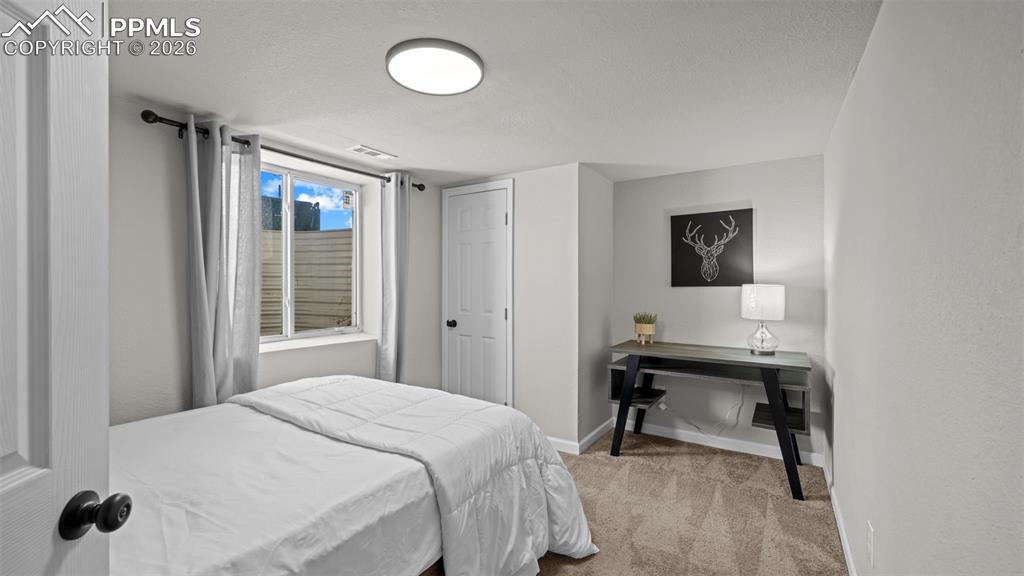 Image 28 of 37: Bedroom