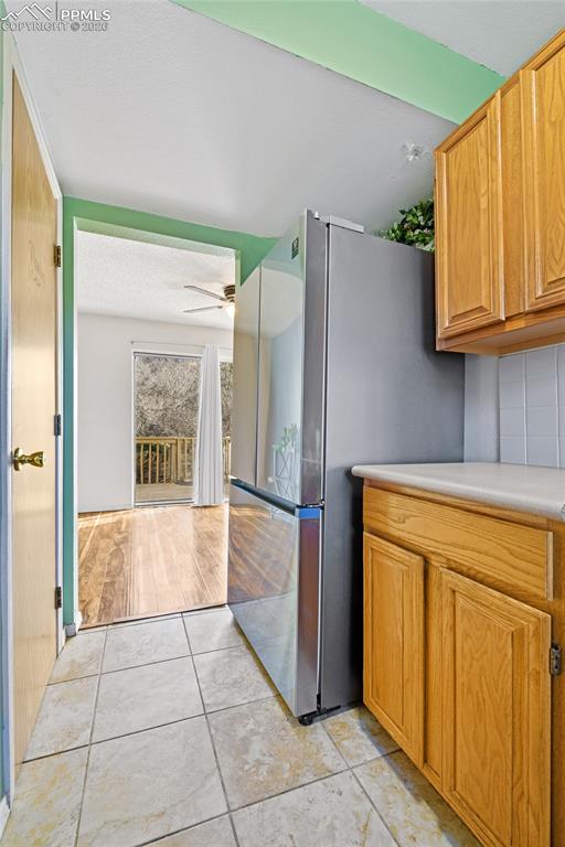 Image 13 of 32: Kitchen With View Into Kitchen Dining Area