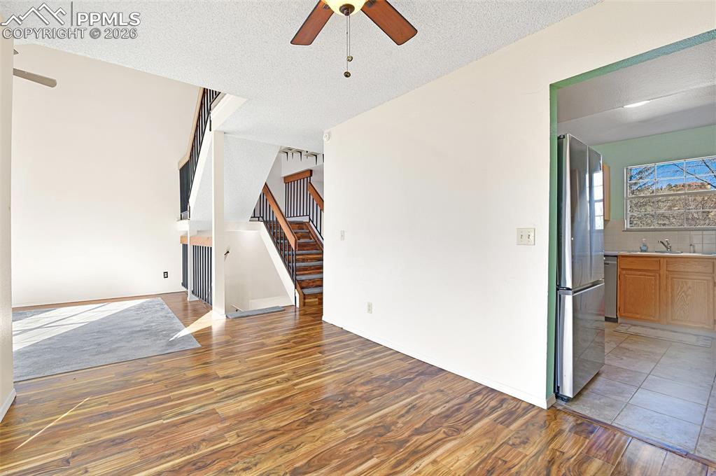 Image 19 of 32: Formal Dining Room With View Into Kitchen And The Living/Great Room
