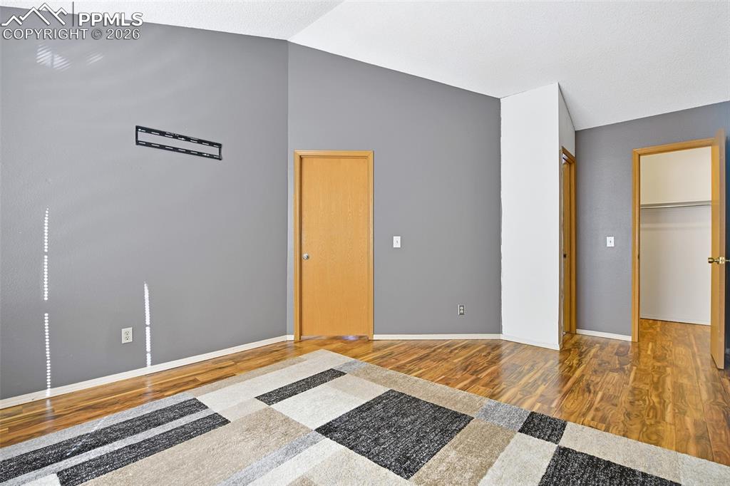 Image 21 of 32: Primary Bedroom With View Of Closet
