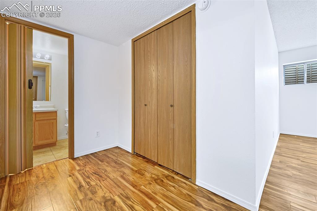 Image 36 of 38: Closet And Bathroom For Bedroom #3