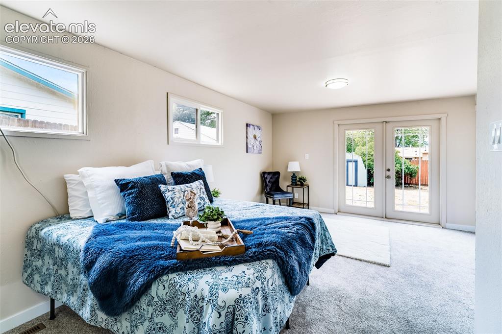 Image 13 of 30: Master Bedroom