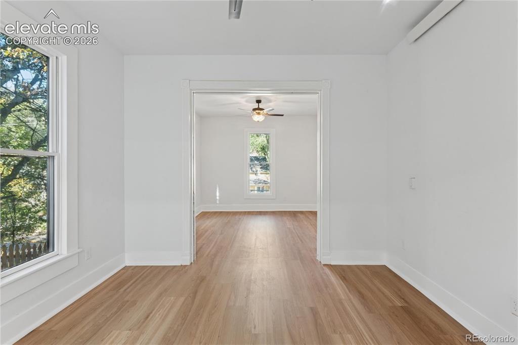 Image 12 of 49: Main-level flat living
area + 2nd bedroom
separated by sliding
doors