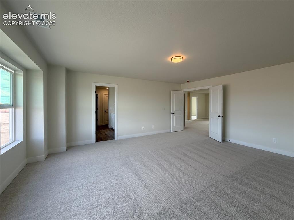 Image 11 of 31: Master Bedroom