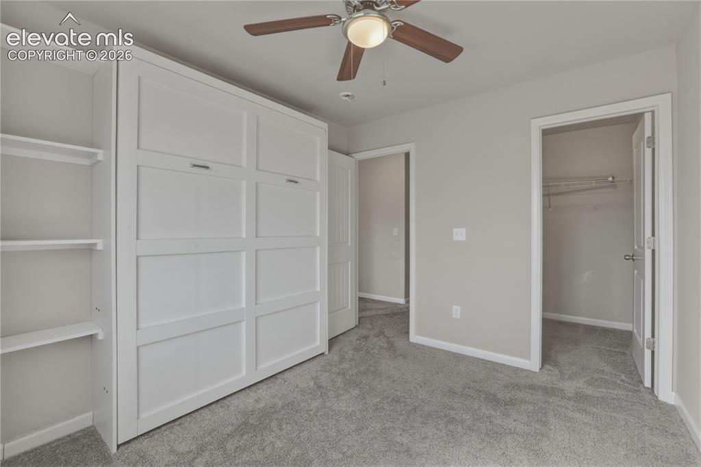 Image 25 of 37: murphy bed in bedroom 3