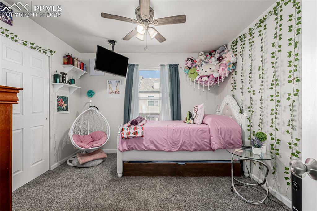 Image 19 of 47: Bedroom featuring carpet floors and a ceiling fan