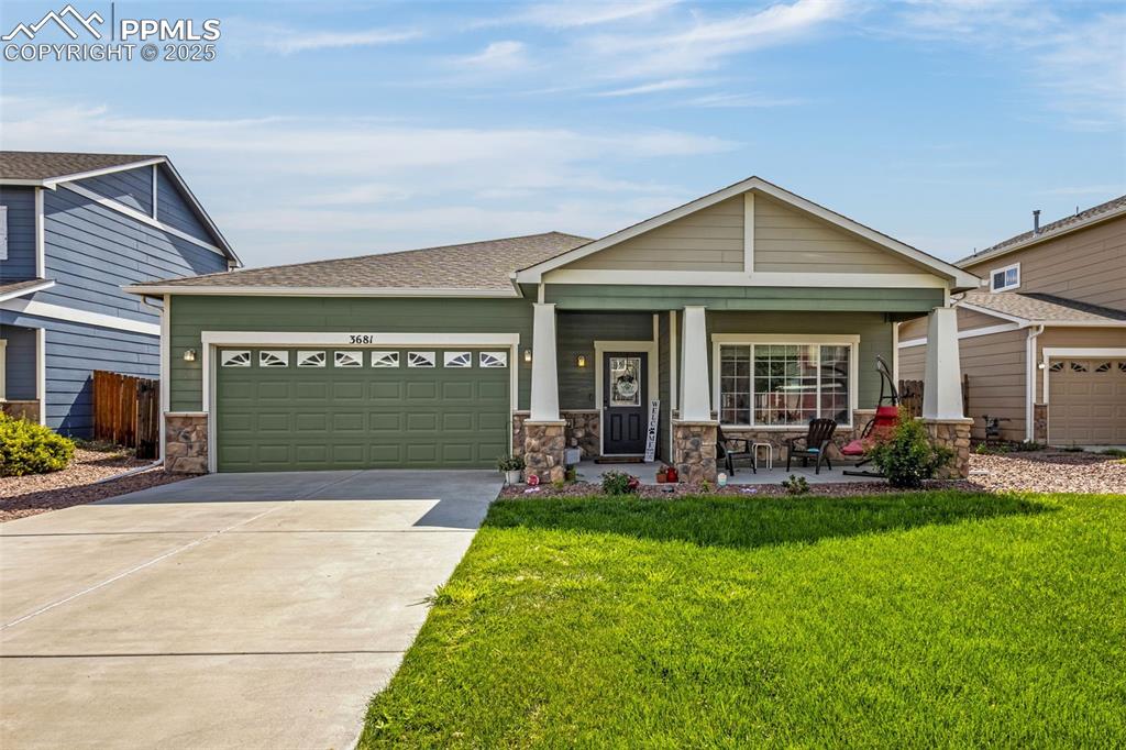 Caption: Craftsman-style ranch home offers ZERO steps/stairs in the Cuchares Ranch community; blend of suburb