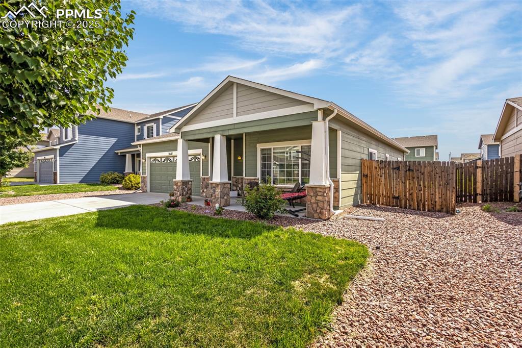 Image 2 of 31: Level lot, low maintenance lawn with Wi-Fi enabled sprinkle system.  Relax 