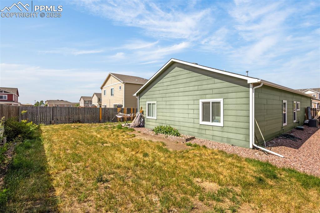 Image 26 of 31: Spacious yard is ready for your final touches.  