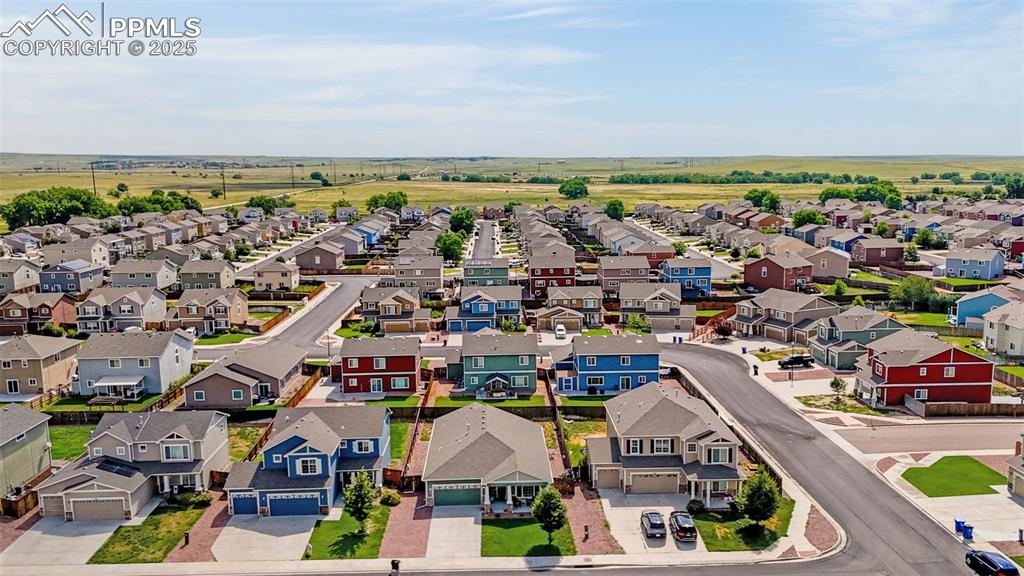 Image 31 of 31: Aerial view of residential area with trails to pocket park with play struct