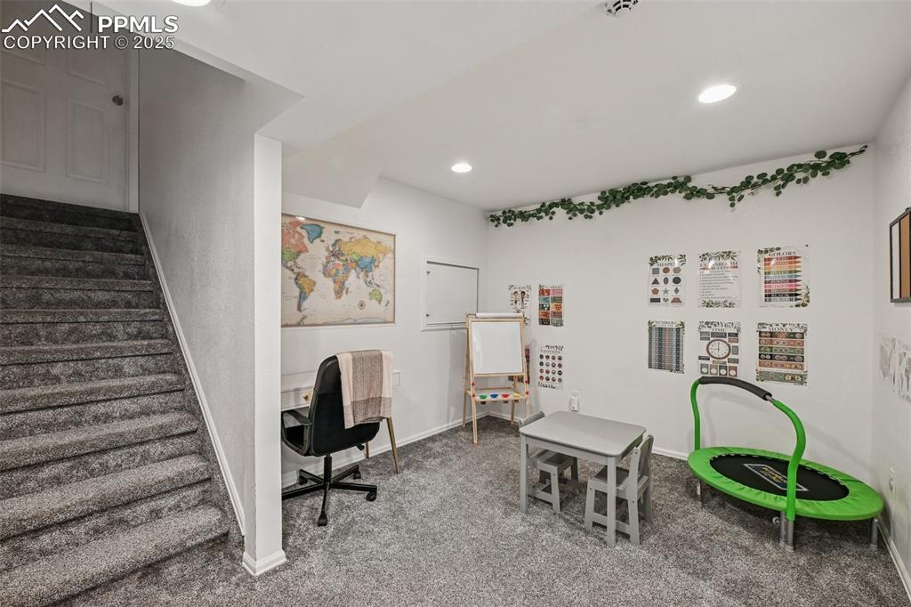 Image 23 of 38: Office area featuring carpet flooring and recessed lighting