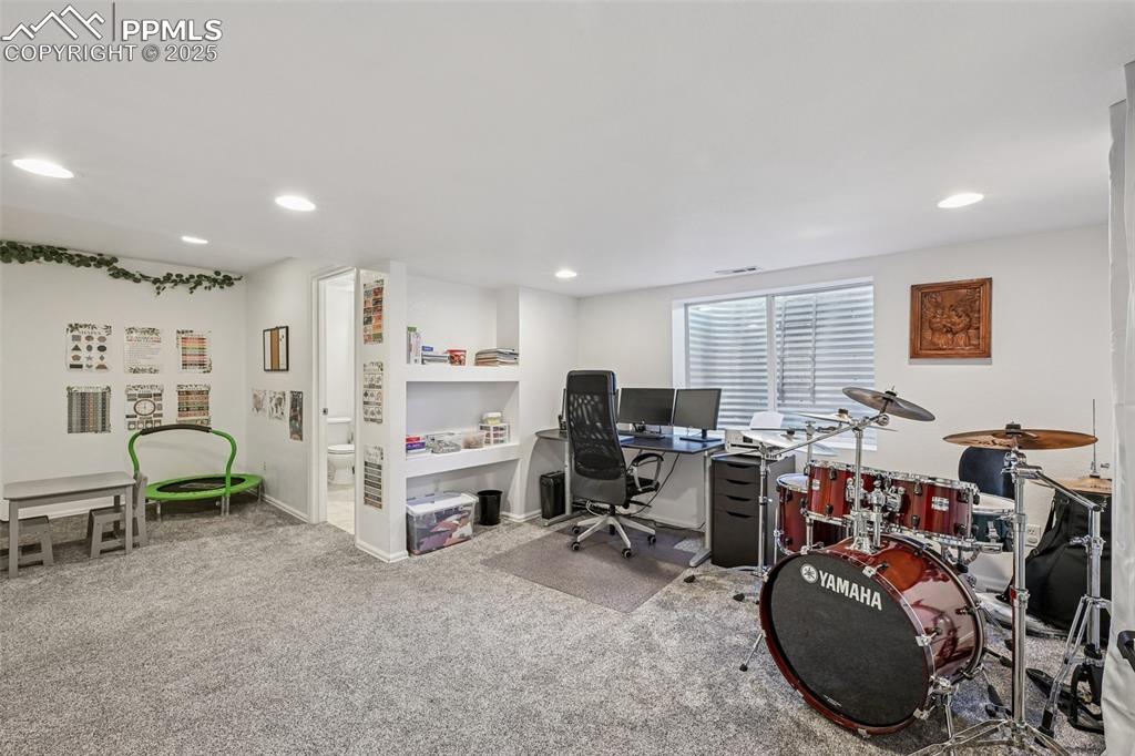 Image 26 of 38: Office space featuring carpet flooring and recessed lighting