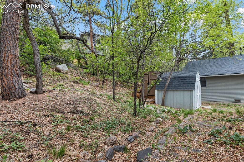 Image 11 of 49: Note: the storage shed belongs to the house next door.