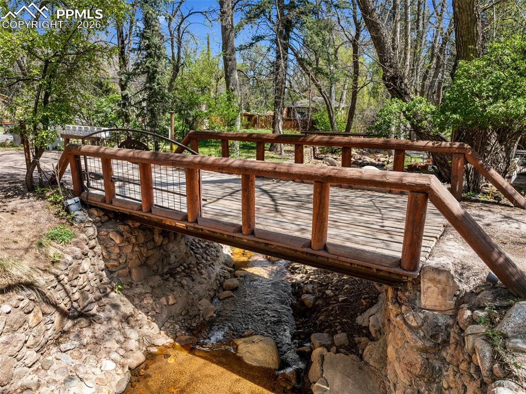 Image 12 of 49: Creek flowing through the area at the main entrance to the subdivision.