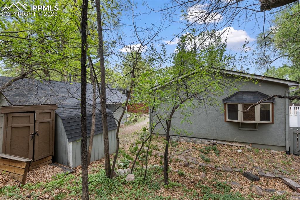 Image 9 of 49: The storage shed belongs to the house next door