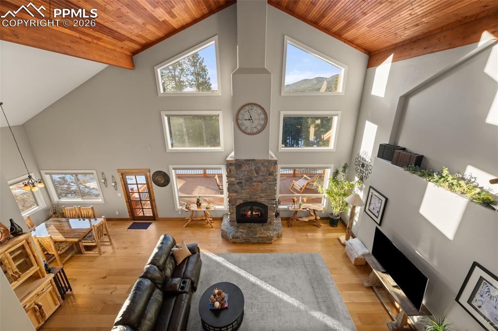 Image 27 of 50: View from loft down to Living Area on main floor