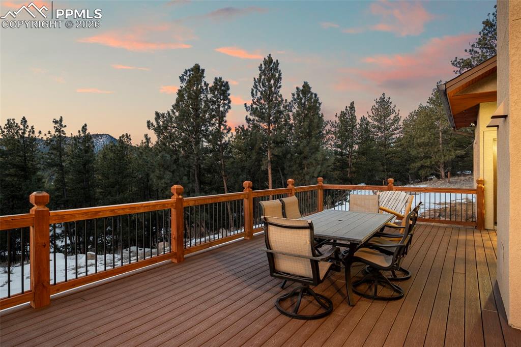 Image 39 of 50: New, composite deck in back of the house.