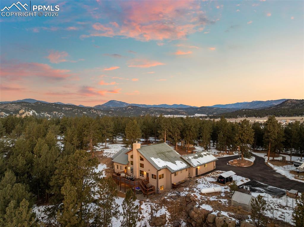 Image 44 of 50: Aerial view from back of house Shows the nice circular driveway for easy a