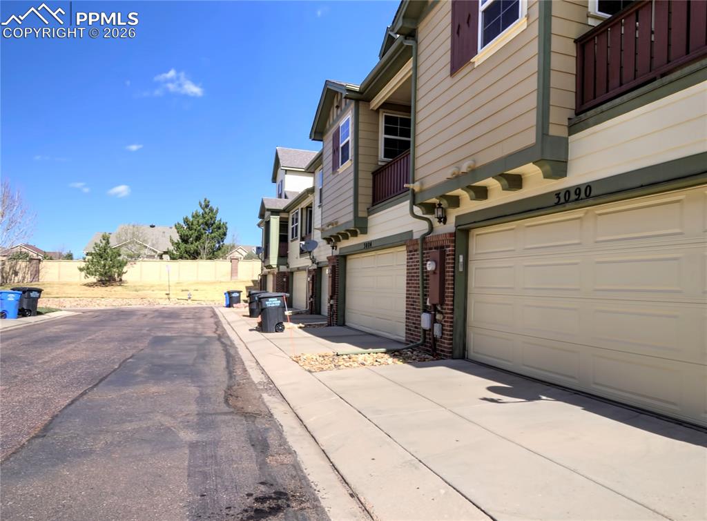 Image 27 of 27: View of road featuring a residential view
