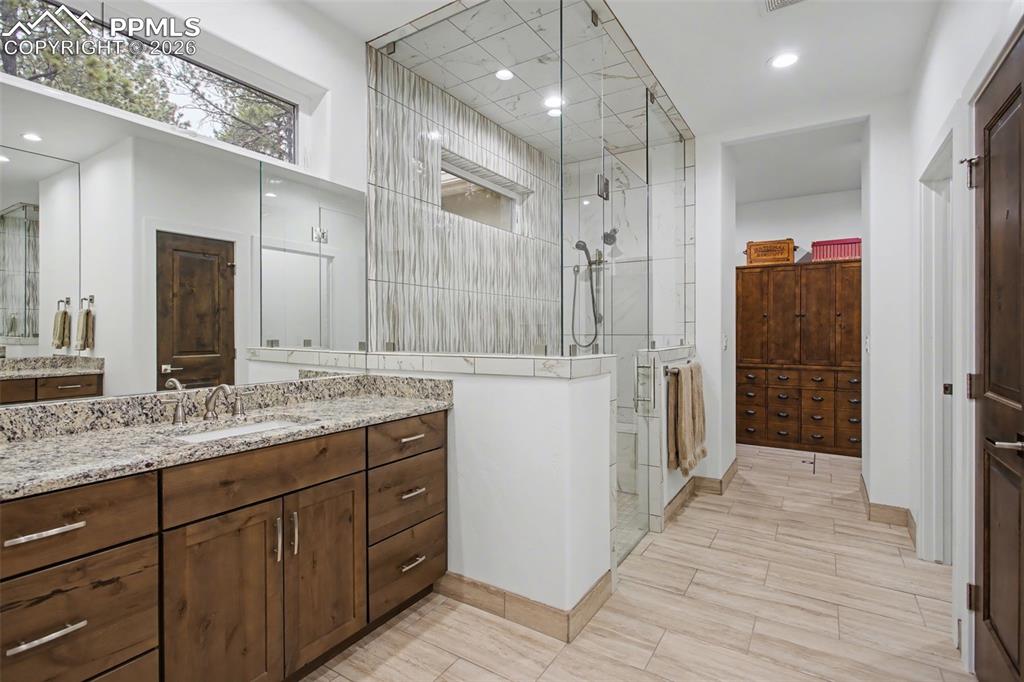 Image 17 of 41: Custom primary bathroom with zero entry shower