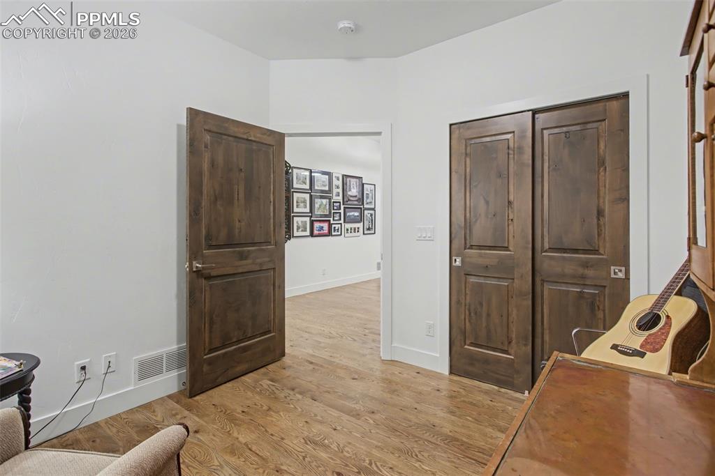 Image 22 of 41: Front office that could be a fourth bedroom