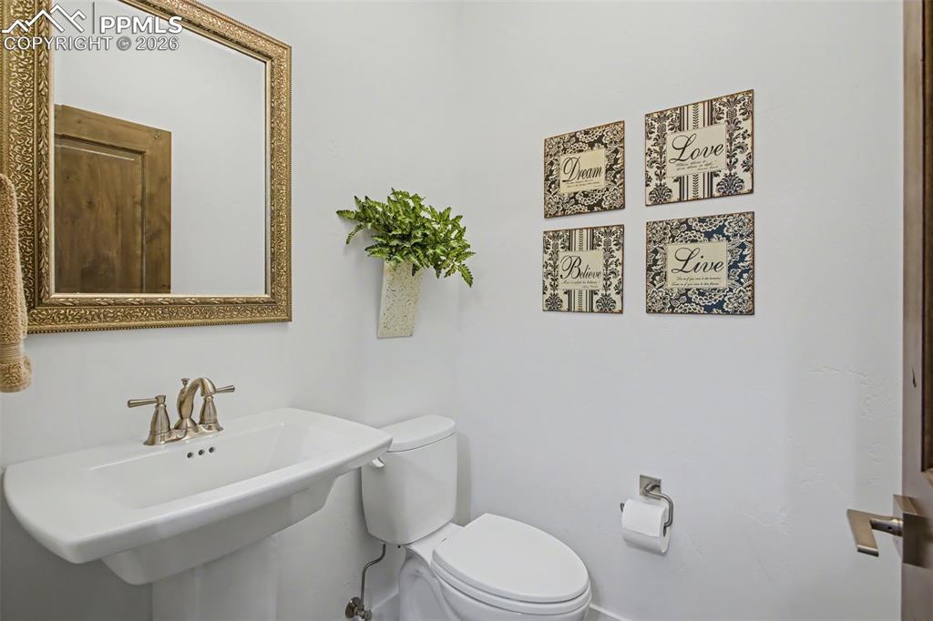 Image 29 of 41: Half bath