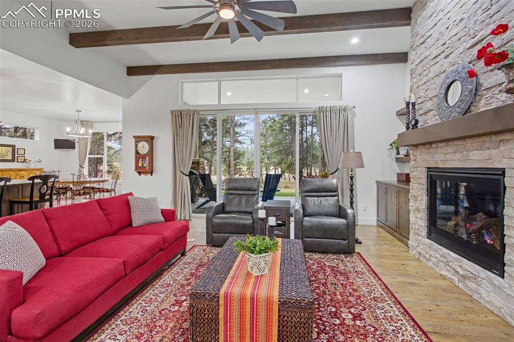 Image 7 of 41: Bring the outdoors inside with large windows and sliding glass doors