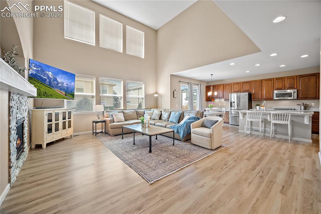 Image 10 of 48: Large picture windows allow for tons of natural light. Laminate flooring ex