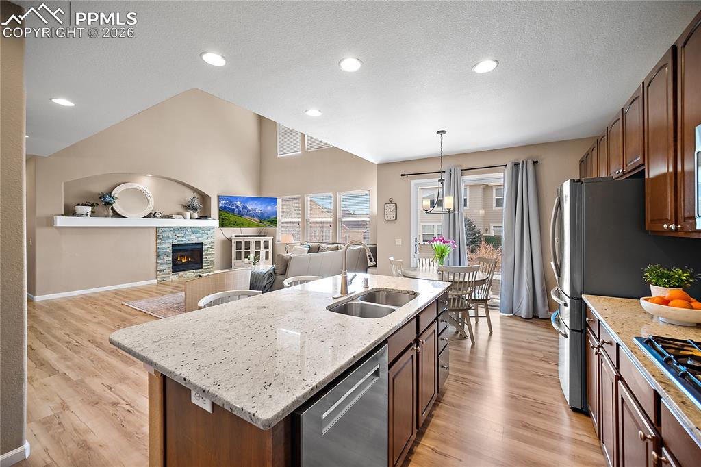 Image 14 of 48: Open to the living room perfect for entertaining. 