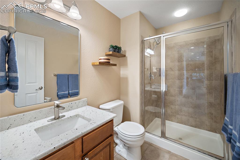 Image 18 of 48: Main level 3/4 bath. 