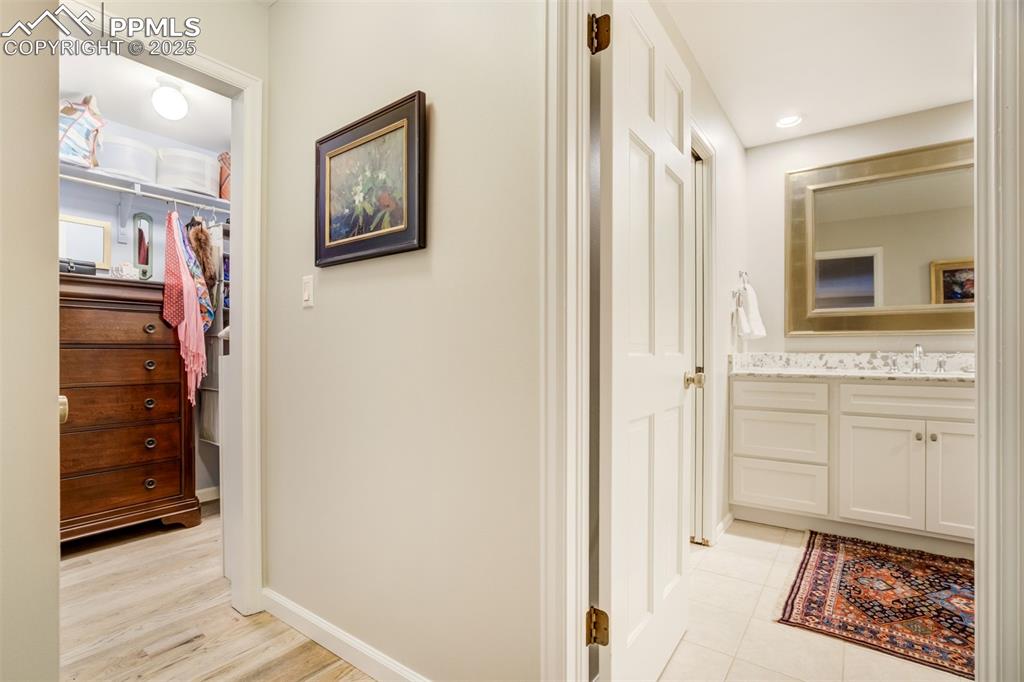 Image 30 of 50: Walk-in Closet, Two in the master