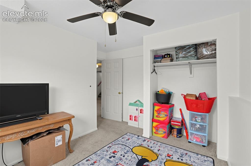 Image 13 of 27: lower bedroom