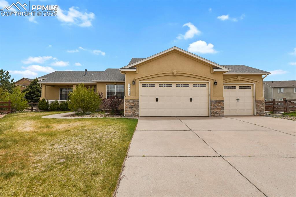 Image 1 of 43: Single-story stucco exterior with stone accents and a covered front porch