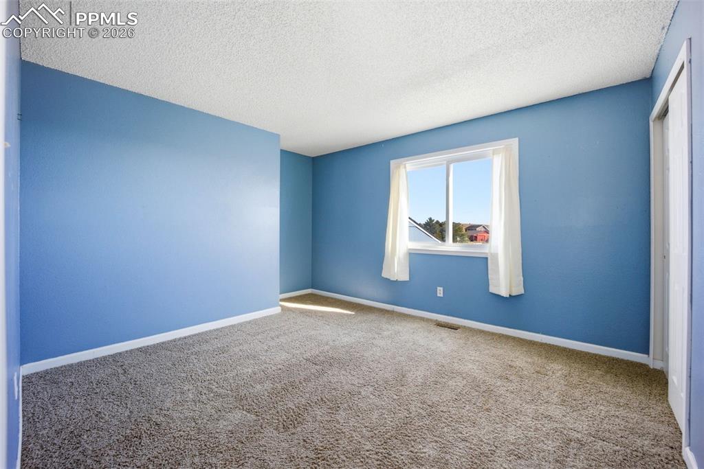 Image 28 of 50: Upper 2nd bedroom